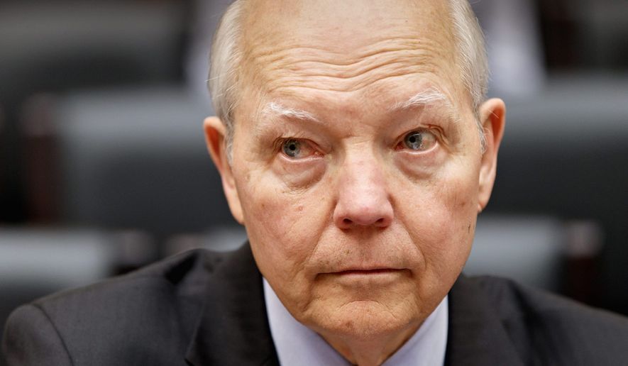 IRS Commissioner John Koskinen answers to the House Oversight Committee at the Capitol in Washington on March 26, 2014, in the panel&#39;s continuing probe of whether tea party groups were improperly targeted for increased scrutiny by the government&#39;s tax agency. (Associated Press) **FILE**