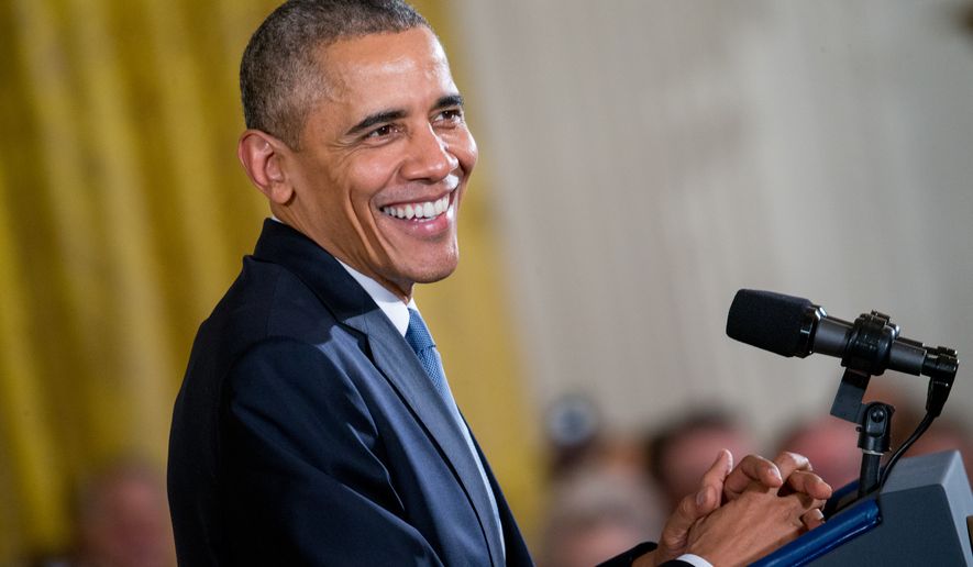 President Obama smiles during a Presidential Medal of Freedom ceremony in the East Room at the White House on Nov. 24, 2015. (Associated Press)