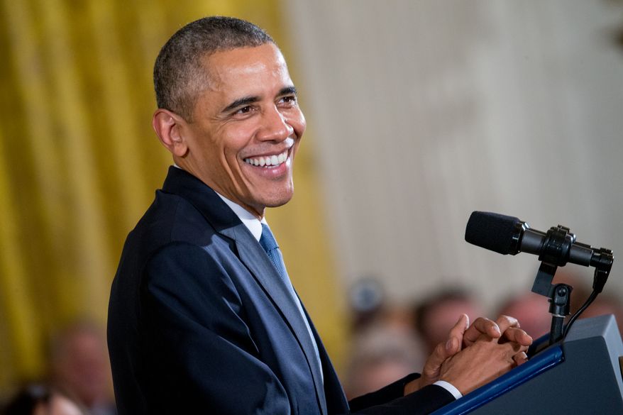 President Obama smiles during a Presidential Medal of Freedom ceremony in the East Room at the White House on Nov. 24, 2015. (Associated Press)