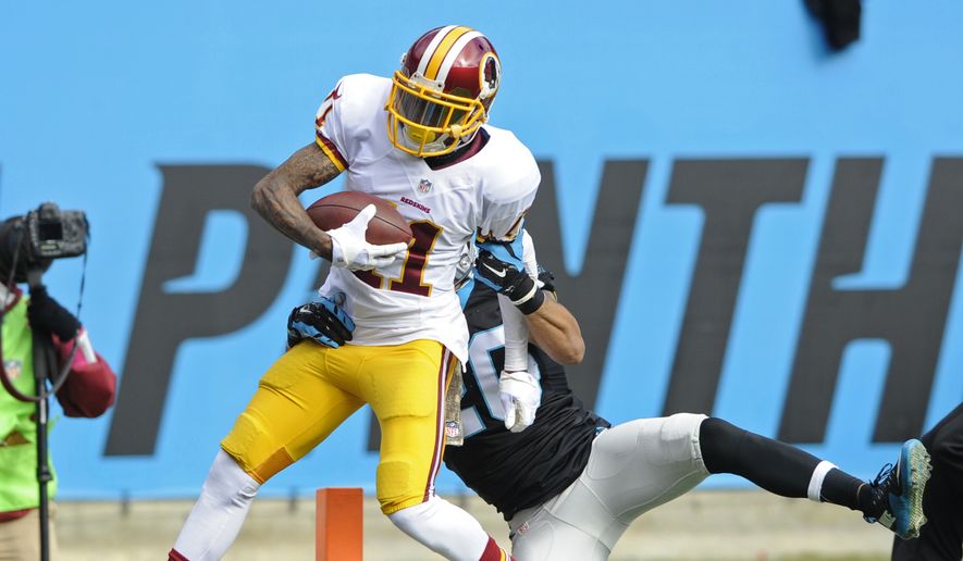 Washington Redskins&#x27; DeSean Jackson (11) runs into the end zone for a touchdown as Carolina Panthers&#x27; Kurt Coleman (20) defends in the first half of an NFL football game in Charlotte, N.C., Sunday, Nov. 22, 2015. (AP Photo/Mike McCarn)
