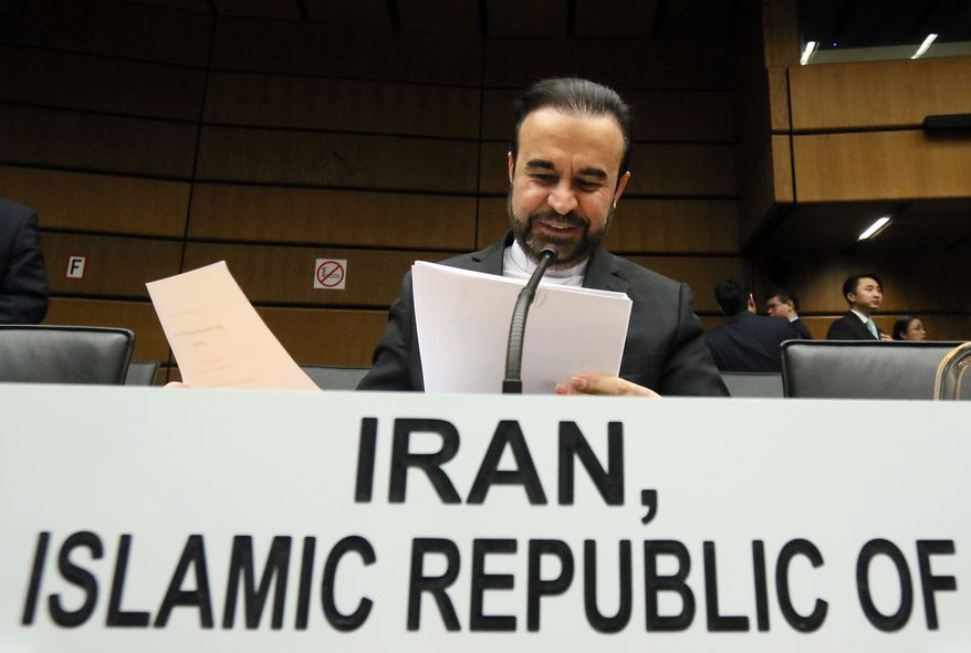 Iran's Ambassador to the International Atomic Energy Agency (IAEA), Reza Najafi, waits for the start of the IAEA board of governors meeting at the International Center, in Vienna, Austria, Thursday, Nov, 26, 2015. (AP Photo/Ronald Zak)