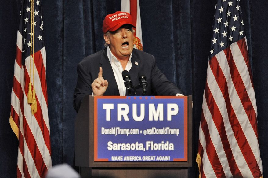 Republican presidential candidate Donald Trump speaks to supporters at a campaign rally Saturday, Nov. 28, 2015 at Robarts Arena in Sarasota, Fla. Trump bragged about his high standing in the polls, slammed super PACS as "a scam" and dismissed nomination rivals Marco Rubio and Jeb Bush in a campaign stop Saturday in their home state of Florida. (AP Photo/Steve Nesius)