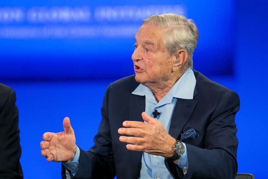 Two pro-democracy foundations launched by U.S. billionaire businessman George Soros have been officially banned by the Russian government. (Associated Press)