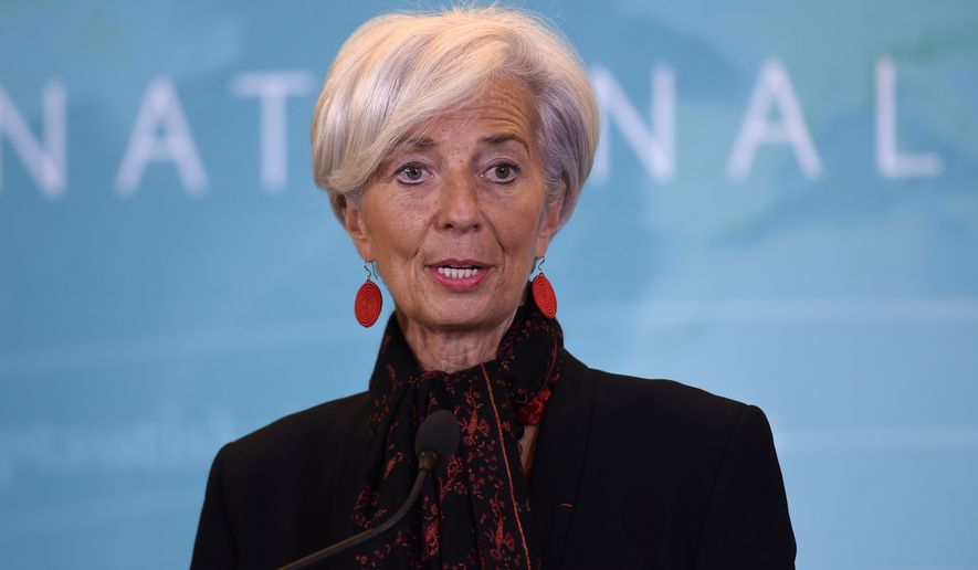 International Monetary Fund (IMF) Managing Director Christine Lagarde speaks during a news conference at the IMF in Washington, Monday, Nov. 30, 2015, to announce the Chinese yuan will join a basket of the world&#x27;s leading currencies.  (AP Photo/Susan Walsh)