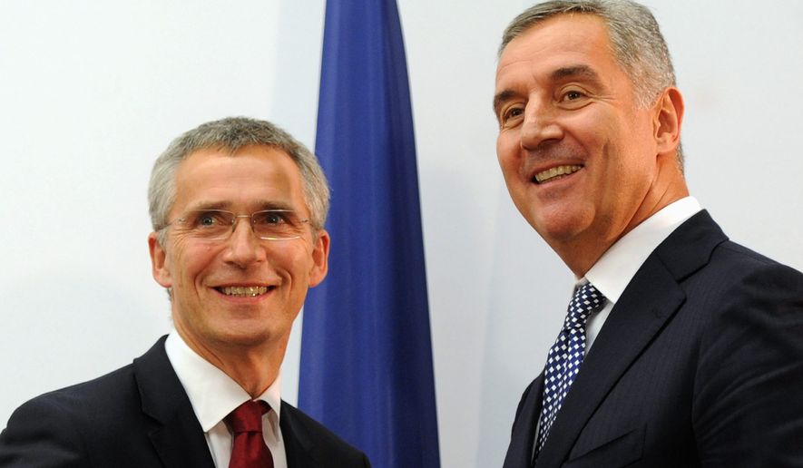 Montenegrin Prime Minister Milo Djukanovic (right) meets with NATO Secretary-General Jens Stoltenberg in Podgorica, Montenegro, in October. Despite its small size, Montenegro&#39;s NATO bid has already sparked an outsize reaction. (Associated Press) ** FILE **