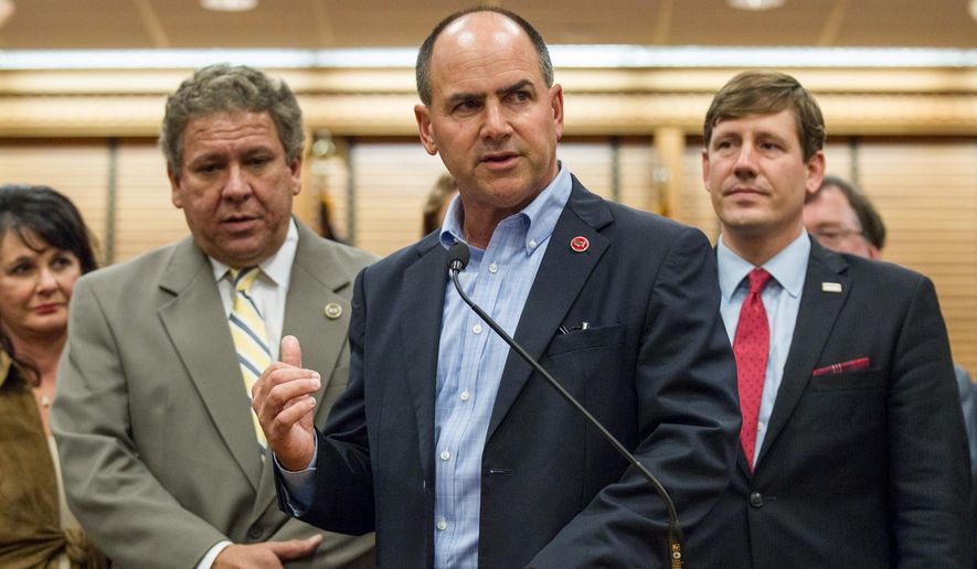 Former U.S. Rep. Zach Wamp, center, announces at a news conference in Nashville, Tenn., on Monday, Nov. 30, 2015, that Republican presidential candidate Marco Rubio has assembled a full slate of delegates in Tennessee. They include state House Majority Leader Gerald McCormick, left, and Sen. Brian Kelsey, right. Wamp was Rubio’s state chairman. (AP Photo/Erik Schelzig) ** FILE **