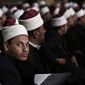 Egyptian Al-Azhar students wait for Sheikh Ahmed el-Tayeb, Grand Imam of Al-Azhar, the pre-eminent institute of Islamic learning in the Sunni Muslim world, to deliver a speech to university students and clerics, at Cairo University, Egypt, Tuesday, Dec. 1, 2015. (AP Photo/Nariman El-Mofty)