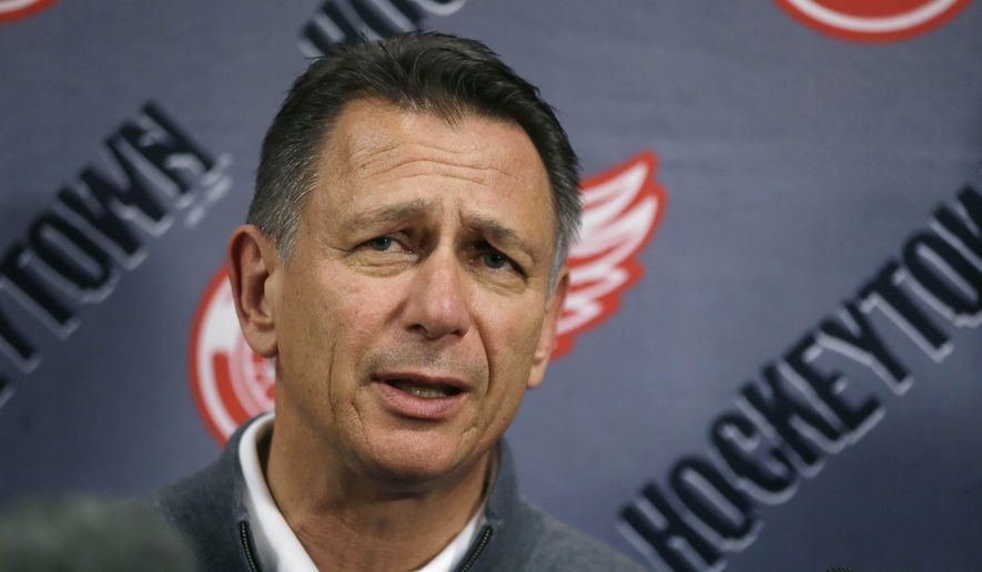 FILE - In this Wednesday, May 20, 2015, file photo, Detroit Red Wings General Manager Ken Holland addresses the media in Detroit to discuss the head coaching vacancy as coach Mike Babcock will now be the new head hockey coach with the Toronto Maple Leafs. Goal-scoring is slipping once again in the NHL. Holland said the decline in scoring is tied to an uptick in competitive balance. (AP Photo/Carlos Osorio, File)