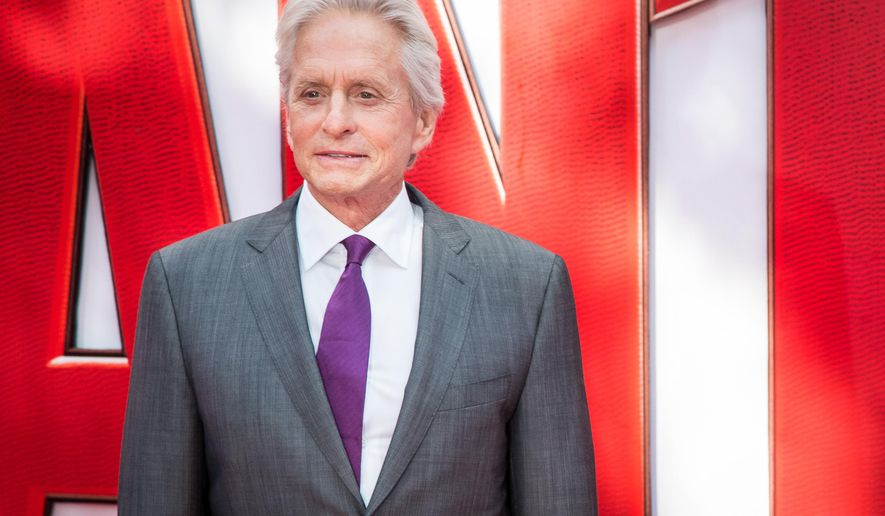 FILE - In this July 8, 2015 file photo, Michael Douglas poses for photographers upon arrival at the premiere of the film &amp;quot;Ant Man,&amp;quot; in London. An emotional Douglas said surviving his cancer scare several years ago gave him new vitality as he settles into his senior years. Douglas, 71, spoke about his health at an AARP luncheon on Thursday, Dec. 3, 2015, celebrating the Academy Award-winner’s storied career and said: “It’s good to be alive.”  (Photo by Vianney Le Caer/Invision/AP, File)
