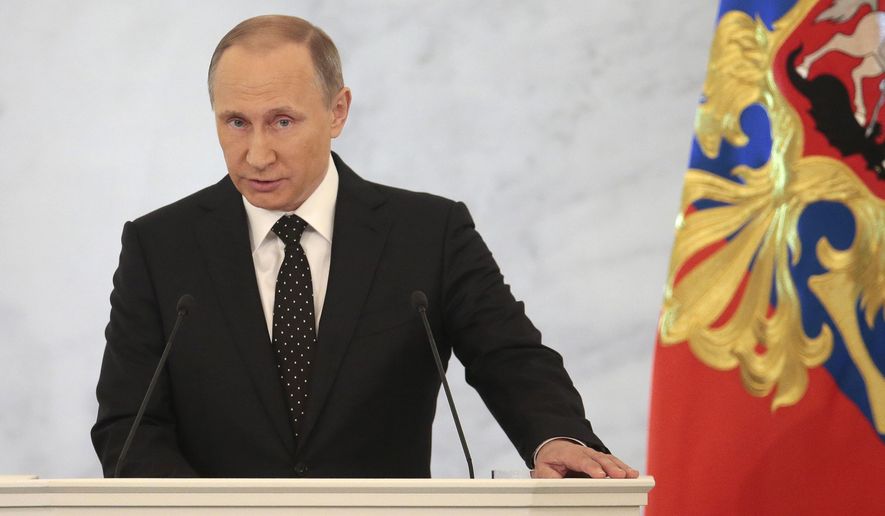 Russian President Vladimir Putin gives his annual state of the nation address in the Kremlin in Moscow, Russia, Thursday, Dec. 3, 2015. Putin says Russian military in Syria has been fighting for Russia&#39;s security. (AP Photo/Ivan Sekretarev) ** FILE **