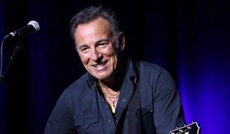 In this Nov. 10, 2015, file photo, Bruce Springsteen performs at the 9th Annual Stand Up For Heroes event in New York. (Photo by Greg Allen/Invision/AP)