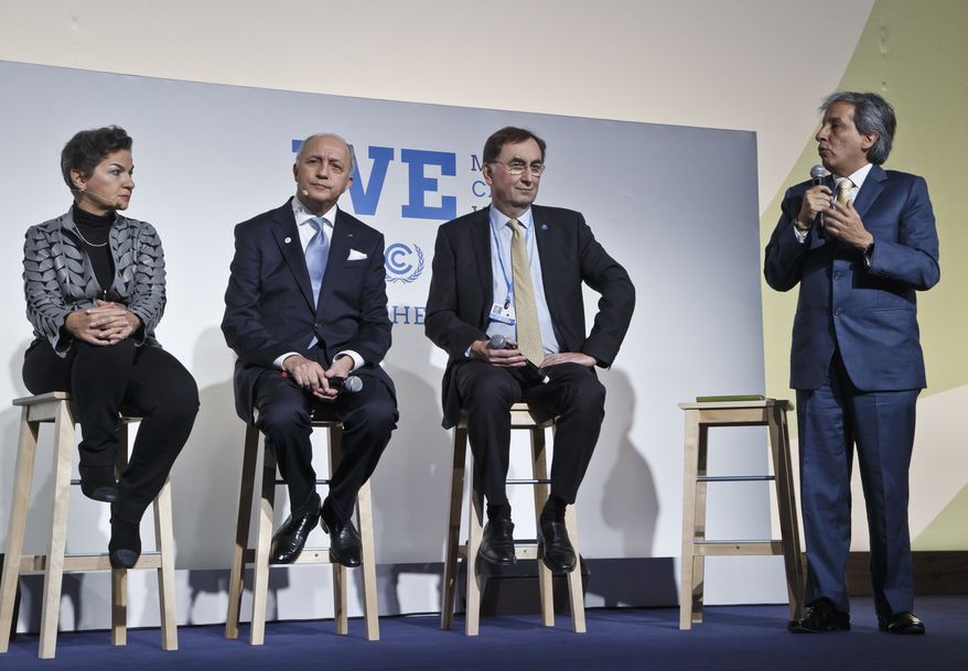 From left, United Nations climate chief Christiana Figueres, French Foreign Minister Laurent Fabius, U.N. delegate Janos Pasztor and Minister of Environment of Peru, Manuel Pulgar Vidal, attend the"Action Day", while , 2nd right, sit next to him at the COP21, United Nations Climate Change Conference, in Le Bourget north of Paris, Saturday, Dec. 5, 2015. President Francois Hollande is encouraging mayors of the world to get involved in fighting climate change and praising those that are already setting an example with low-emission buildings and public transport policies. United Nations climate chief Christiana Figueres, (AP PhotoMichel Euler)