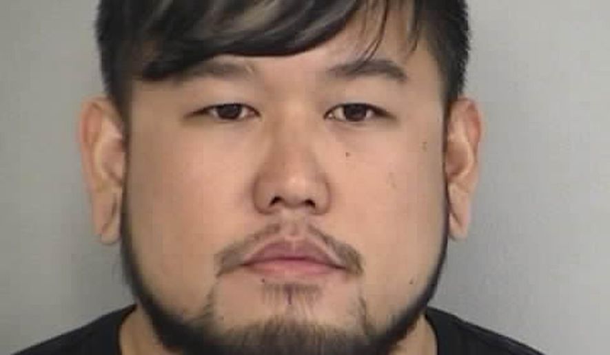 This Friday, Dec. 4, 2015, booking photo, provided by the North Las Vegas Police Department shows suspect Jimmy Carter Kim, of North Las Vegas. Police say Kim was arrested on felony kidnapping and child sexual assault charges after a 14-year-old Arizona girl escaped from a home where she said Kim kept her captive for about a month. (North Las Vegas Police Department via AP)