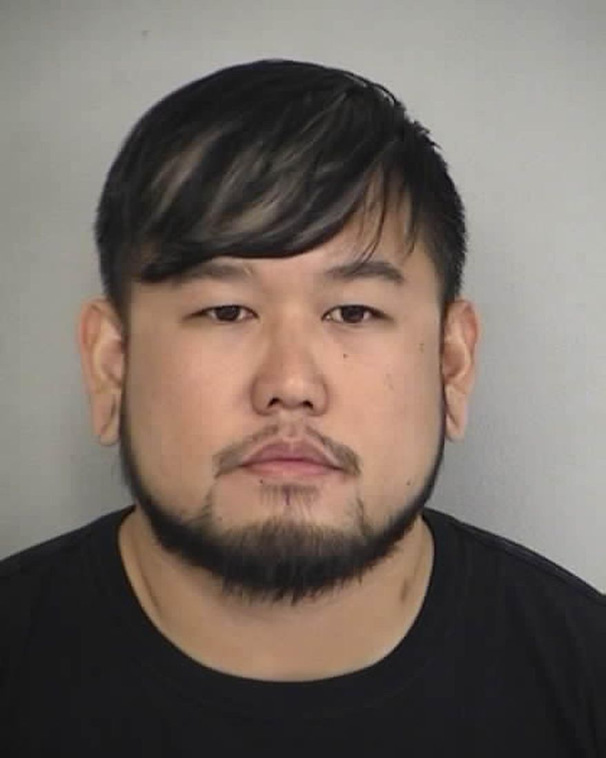 This Friday, Dec. 4, 2015, booking photo, provided by the North Las Vegas Police Department shows suspect Jimmy Carter Kim, of North Las Vegas. Police say Kim was arrested on felony kidnapping and child sexual assault charges after a 14-year-old Arizona girl escaped from a home where she said Kim kept her captive for about a month. (North Las Vegas Police Department via AP)