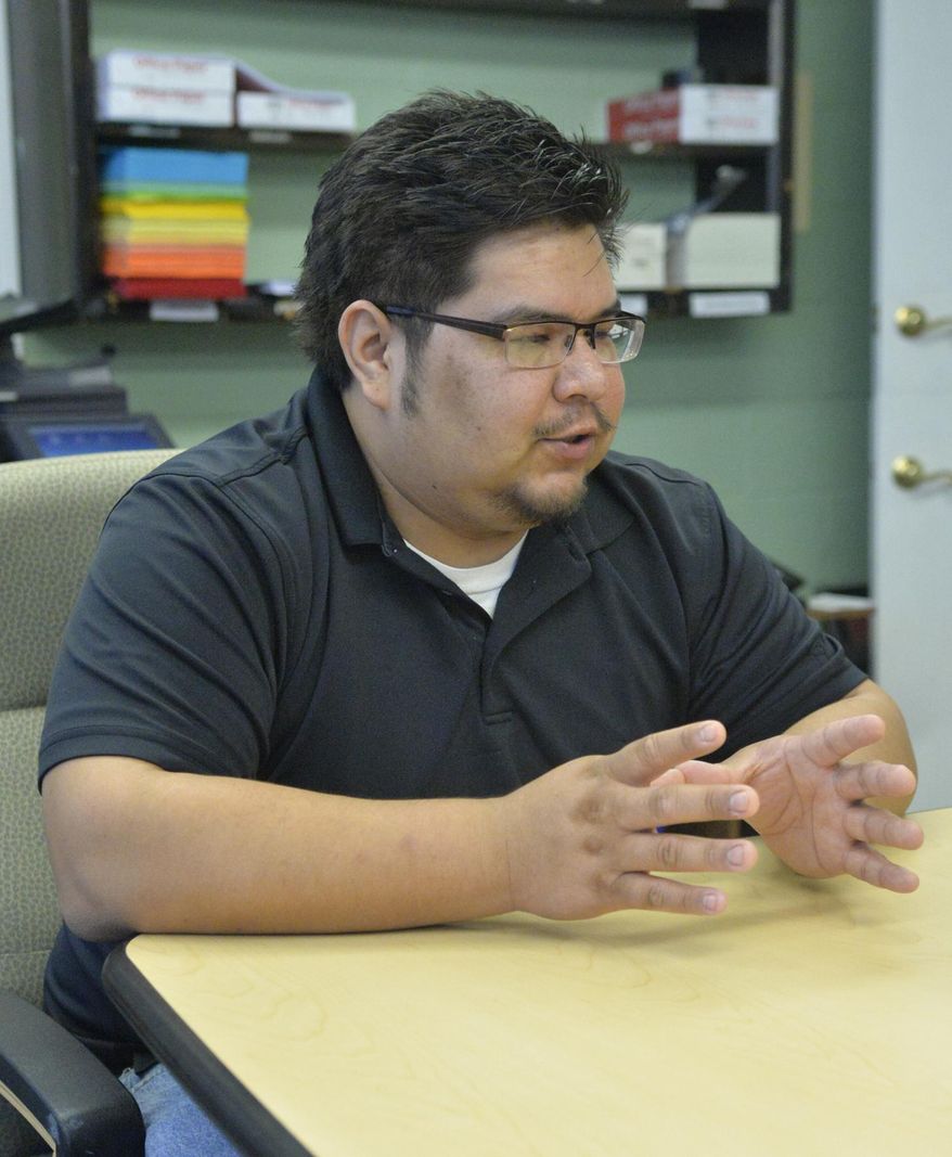 ADVANCE FOR THE WEEKEND OF DEC. 5-6 AND THEREAFTER - In a Nov. 18, 2015 photo, Lewis St. Cyr talks about the Ho Chunk Renaissance language program in Winnebago, Neb. The importance of language is one of the driving forces behind the Ho-Chunk Tribe, also known as the Winnebago Tribe of Nebraska, seeking to revitalize its language and see it spoken by more people, part of what is called the Ho-Chunk Renaissance. The language project currently is being taught in various schools with ties to the tribe. (Jake Wragge/Norfolk Daily News via AP)