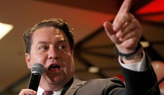 Arizona Attorney General Mark Brnovich contends voting district are drawn intentionally to pack white voters into one area to outnumber Hispanic voters. (Associated Press)