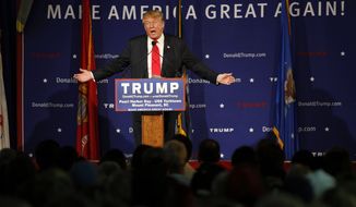 Republican presidential candidate, businessman Donald Trump, speaks during a rally coinciding with Pearl Harbor Day at Patriots Point aboard the aircraft carrier USS Yorktown in Mt. Pleasant, S.C., Monday, Dec. 7, 2015. Trump defended his plan, Tuesday, Dec. 8, 2015, for a &quot;total and complete shutdown of Muslims entering the United States&quot; by comparing it with President Franklin Roosevelt&#x27;s decision to inter Japanese Americans during World War II. (AP Photo/Mic Smith)