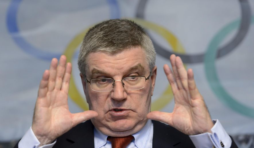 International Olympic Committee (IOC) president German Thomas Bach speaks during a media round table on the eve of an executive board meeting at the IOC headquarters, in Lausanne, Switzerland, Monday, Dec. 7, 2015. (Laurent Gillieron/Keystone via AP)