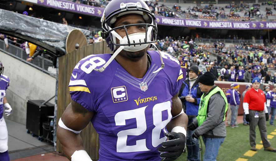 Minnesota Vikings running back Adrian Peterson (28) takes the field for warmups before an NFL football game against the Seattle Seahawks, Sunday, Dec. 6, 2015 in Minneapolis. (AP Photo/Ann Heisenfelt)