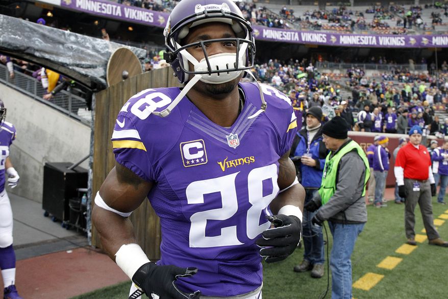 Minnesota Vikings running back Adrian Peterson (28) takes the field for warmups before an NFL football game against the Seattle Seahawks, Sunday, Dec. 6, 2015 in Minneapolis. (AP Photo/Ann Heisenfelt)