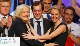 Marine Le Pen, leader of France&#39;s National Front Party, celebrates with a breakout star: her 26-year-old niece, Marion Marechal-Le Pen, who was one of the big vote-getters Sunday in the southern region of Provence-Alpes-Cote d&#39;Azur. (Associated Press)