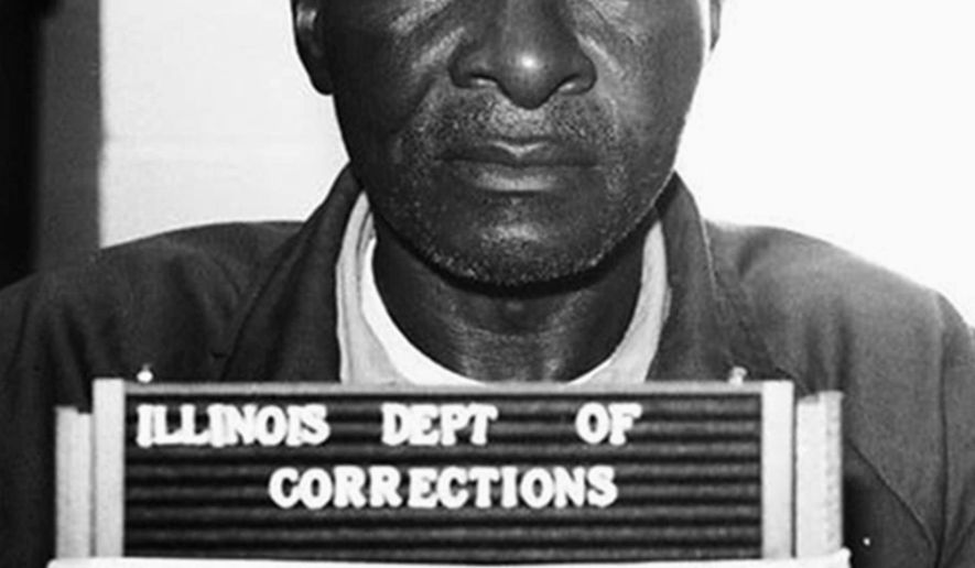 FILE - This August 1993 file photo from the Illinois Department of Corrections via The Southern shows Grover Thompson in the Menard Correctional Center in Dwight, Ill. Illinois Gov. Bruce Rauner has rejected a clemency request on behalf of Thompson, a deceased Illinois prisoner convicted in a stabbing to which a serial killer later confessed. The clemency was denied even though in 2007, Timothy Krajcir confessed to the 1981 attack to former Carbondale police detective Paul Echols. (Illinois Department of Corrections/The Southern via AP, File)