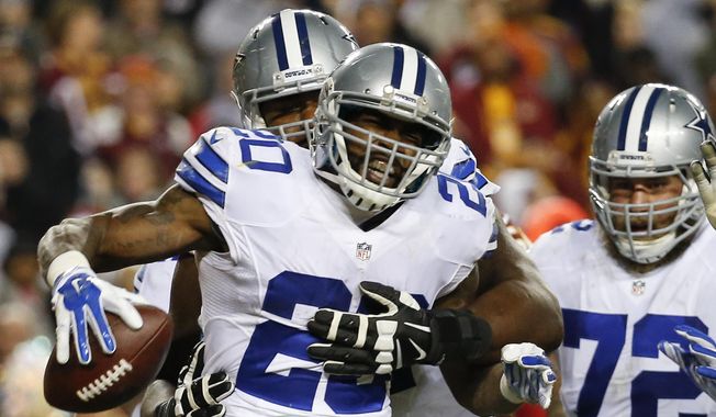 FILE - In this Dec. 7, 2015, file photo, Dallas Cowboys running back Darren McFadden (20) celebrates his touchdown during the second half of an NFL football game against the Washington Redskins in Landover, Md. The Cowboys play the Green Bay Packers on Sunday in Green Bay, Wisc. (AP Photo/Alex Brandon, File) **FILE**
