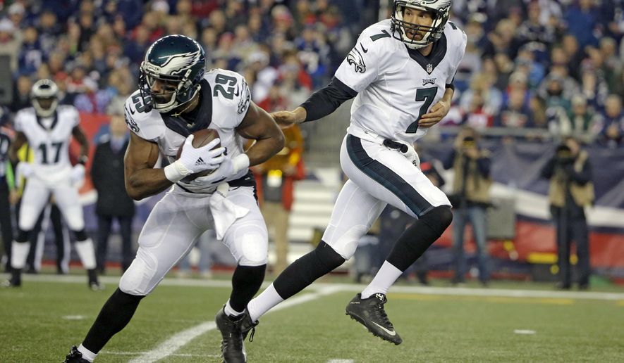FILE - In this  Sunday, Dec. 6, 2015 file photo, Philadelphia Eagles quarterback Sam Bradford (7) hands off to running back DeMarco Murray (29) during the first half of an NFL football game against the New England Patrios in Foxborough, Mass. The 2014 NFL rushing champion made no demands, “Just Give Me The Damn Ball” in his first comments to the media since a report said he complained about his role to owner Jeffrey Lurie on the plane ride home following a 35-28 win over the Patriots. (AP Photo/Steven Senne, File)