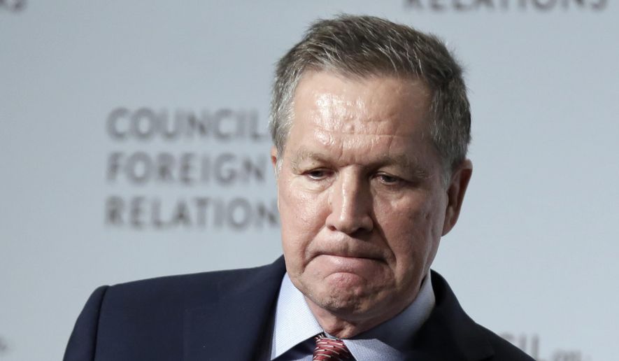Republican presidential candidate, Ohio Gov. John Kasich, pauses while speaking to the Council on Foreign Relations, in New York, Wednesday, Dec. 9, 2015. (AP Photo/Richard Drew)