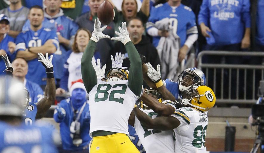 FILE - In this Dec. 3, 2015 file photo, Green Bay Packers tight end Richard Rodgers (82) reaches to catch the game winning pass on the last play of an NFL football game against the Detroit Lions, in Detroit. There are few veterans better for a young tight end to study on the field than Dallas' Jason Witten. Packers second-year player Rodgers gets to see him up close on Sunday, Dec. 13. (AP Photo/Duane Burleson, File)