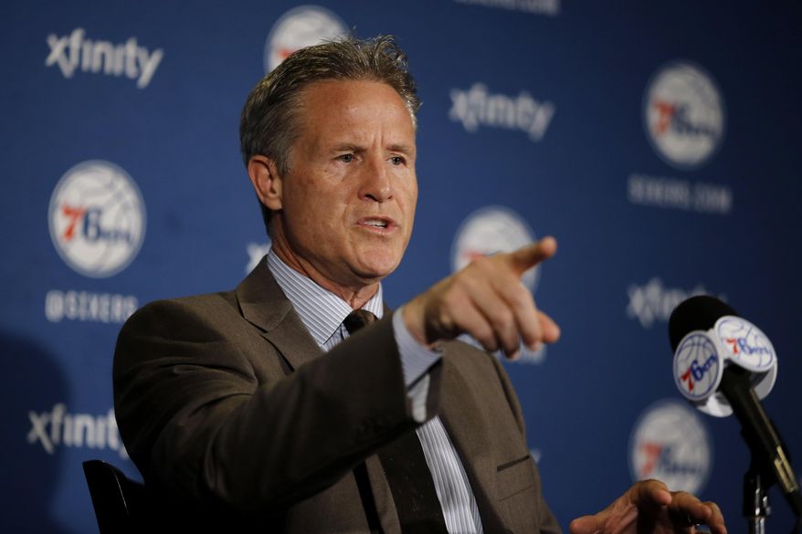 Philadelphia 76ers head coach Brett Brown speaks at a news conference before an NBA basketball game against the Detroit Pistons, Friday, Dec. 11, 2015, in Philadelphia. (AP Photo/Matt Slocum)