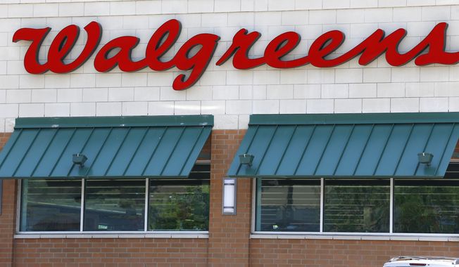 This June 21, 2013 photo shows the Walgreens store in Wexford, Pa. The Federal Trade Commission wants more information about Walgreens’ $9.41-billion plan to buy rival drugstore chain Rite Aid, a sign that regulators may be worried about the deal’s impact on competition. Walgreens said Friday, Dec. 11, 2015  that it fielded a request for additional information beyond what the companies have already been required to provide under the Hart-Scott-Rodino Antitrust Improvements Act of 1976. Walgreens said it expected the request.  (AP Photo/Keith Srakocic)