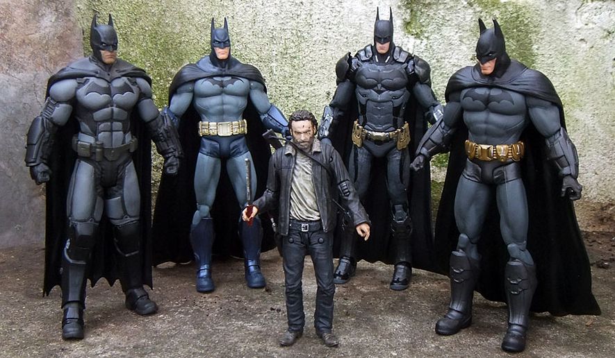 Zadzooks' gift ideas for action figure fans include the Batman Arkham collection featuring four versions of the Dark Knight based on a popular video game franchise and Rick Grimes from "The Walking Dead" television show. (Photograph by Joseph Szadkowski / The Washington Times)