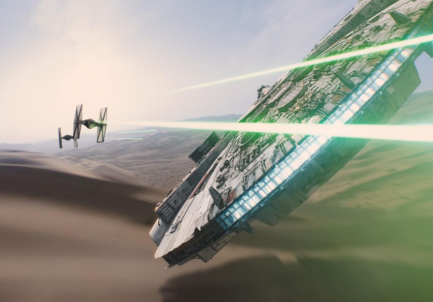 This photo provided by Disney/Lucasfilm shows a scene from the new film, &quot;Star Wars: The Force Awakens.&quot; Here, imperial TIE Fighters (left) attack Han Solo&#39;s ship, the Millennium Falcon. The movie releases in U.S. theaters on Dec. 18, 2015. (Film Frame/Disney/Lucasfilm via AP)