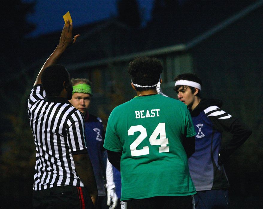 The Portland Augureys play the Western Washington Wyverns at the first Portland Quidditch Tournament at the 53rd Avenue Community Park in Hillsboro on Saturday, Dec. 5, 2015. (Jamie Hale/The Oregonian via AP) MAGS OUT, TV OUT, NO LOCAL INTERNET (THE MERCURY, WILLAMETTE WEEK, PAMPLIN MEDIA GROUP OUT)