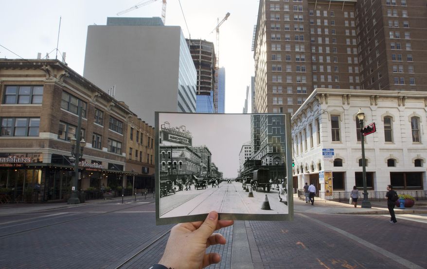 A 1920 photo looking toward Texas Avenue along Main Street is seen juxtaposed with present day, Monday, Dec. 7, 2015, in Houston. Old Spanish Trail, the road in Houston, isn't the Old Spanish Trail, formed a century ago as one of the south's first paved intercity highways for automobiles. Main Street was the original route. At the century mark of the road's beginnings, a conference is hoping to raise awareness of the long-forgotten route from St. Augustine, Fla. to San Diego, in the hopes of having a nationwide celebration in 2029. (Cody Duty/Houston Chronicle)