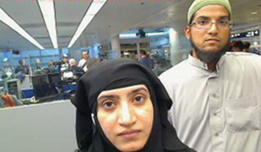 This July 27, 2014 photo provided by U.S. Customs and Border Protection shows Tashfeen Malik, left, and Syed Farook, as they passed through O'Hare International Airport in Chicago. (Associated Press)