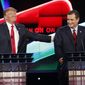 Donald Trump, left, jokes with Ted Cruz during the CNN Republican presidential debate at the Venetian Hotel &amp; Casino on Tuesday, Dec. 15, 2015, in Las Vegas. (AP Photo/John Locher) ** FILE **