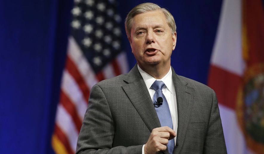 &quot;Sen. [Rand] Paul and Sen. [Ted] Cruz are both isolationist,&quot; Sen. Lindsey Graham said, arguing that the United States should go after ISIS in Iraq and Syria and reinstate the NSA&#39;s controversial bulk metadata program. (Associated Press)