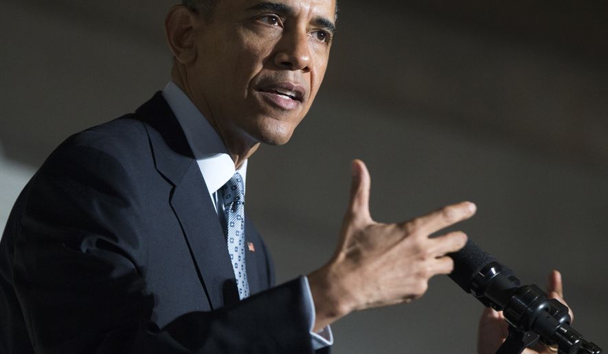 President Barack Obama speaks during a naturalization ceremony at the National Archives in Washington, Tuesday, Dec. 15, 2015. The president described immigration as the nation's oldest tradition and part of what makes the country exceptional, as he sought to draw a contrast between those who want to seal the borders and those seeking to escape hardships and persecution. (AP Photo/Evan Vucci)