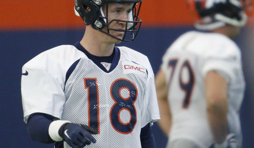 Denver Broncos quarterback Peyton Manning warms up during a practice at the team&#39;s headquarters Wednesday, Dec.16, 2015, in Englewood, Colo. (AP Photo/David Zalubowski)