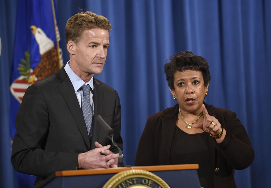 FILE - In this Dec. 7, 2015 file photo, U.S. Attorney General Loretta Lynch, right, and U.S. Attorney in Chicago Zachary Fardon speak at a news conference at the Justice Department in Washington about an investigation of the Chicago Police Department. Federal officials are meeting with Chicago police Wednesday, Dec. 16, 2015, as the U.S. Department of Justice launches a civil rights probe triggered by the shooting death of a black teenager by a white police officer. (AP Photo/Susan Walsh, File)