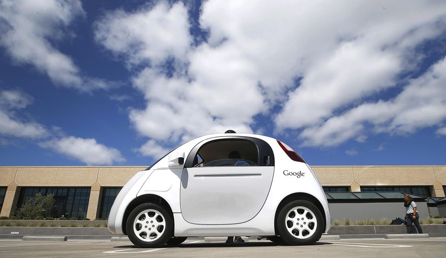 FILE - In this May 13, 2015, file photo, Google's new self-driving prototype car is presented during a demonstration at the Google campus in Mountain View, Calif. California unveiled precedent-setting draft rules Wednesday, Dec. 16, 2015 that would slow the public's access to self-driving cars of the future until regulators are confident the technology is safe. (AP Photo/Tony Avelar, File)