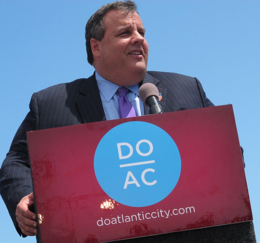 This May 24, 2012 photo shows New Jersey Gov. Chris Christie speaking on the Atlantic City, N.J., boardwalk. On Thursday, Dec. 17, 2015, the New Jersey Legislature plans to consider changes Christie requested to a financial assistance package for Atlantic City and its struggling casino industry. (AP Photo/Wayne Parry)