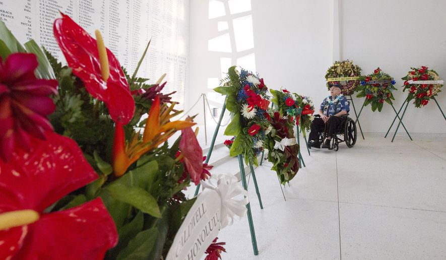 ADVANCE FOR THE WEEKEND OF DEC. 19-20 AND THEREAFTER - In this Dec. 12, 2015 photo, U.S.S. Arizona crew member and survivor Lauren Bruner, 95, visit the U.S.S. Arizona memorial in Honolulu. Coming as early as January is a smartphone application that will walk visitors through a bit of Hawaii in late 1941 through Bruner’s eyes and period photos immediately before, during and after the day of infamy. (Cindy Ellen Russell/Honolulu Star-Advertiser via AP)
