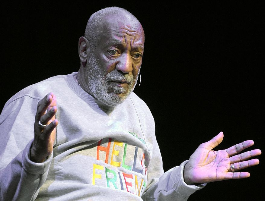 FILE - In this Friday, Nov. 21, 2014, file photo, comedian Bill Cosby performs at the Maxwell C. King Center for the Performing Arts, in Melbourne, Fla. Lawyers for Cosby say they will fight an attempt to require the comedian’s wife to give a sworn deposition in a defamation lawsuit filed by seven women who have accused Cosby of sexually assaulting them decades ago. A lawyer for the women has subpoenaed Camille Cosby to be deposed on Jan. 6, 2016, at a Springfield hotel. (AP Photo/Phelan M. Ebenhack, File)