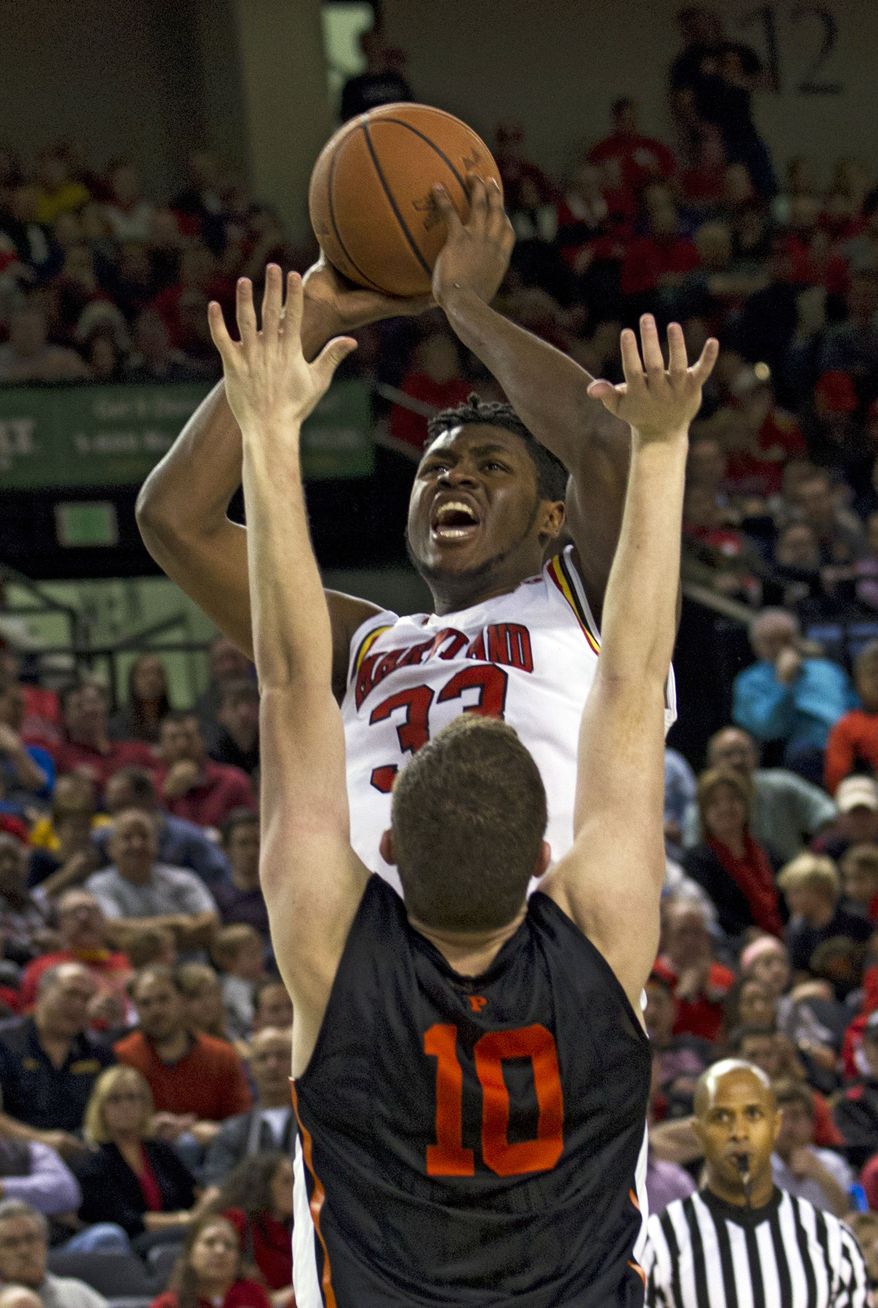 Maryland's Diamond Stone (33) goes to the basket as Princeton's Spencer Weisz(10) tries to block during the second half of an NCAA college basketball game at Royal Farms Arena in Baltimore, Saturday, Dec. 19, 2015. (AP Photo/Jose Luis Magana)