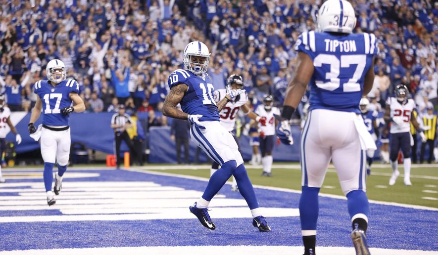 Indianapolis Colts&#39; Donte Moncrief (10) celebrates after a 11-yard touchdown reception during the first half of an NFL football game against the Houston Texans, Sunday, Dec. 20, 2015, in Indianapolis. (AP Photo/AJ Mast)