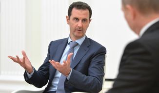 Behind the scenes, the White House is embracing a strategy that would leave the Syria President Bashar Assad in place as the world unites against a greater immediate threat from Islamic State terrorists. (Associated Press)