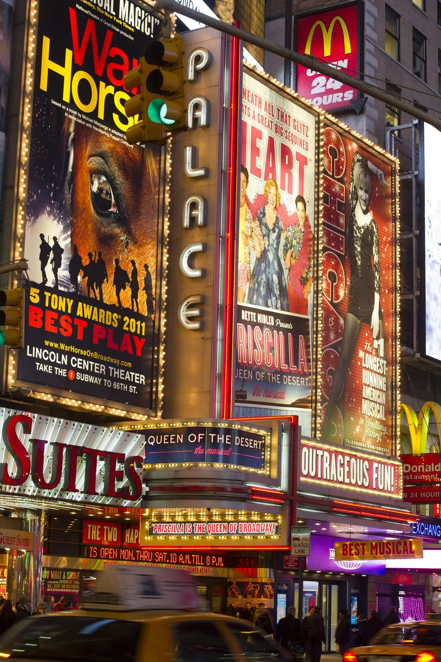 FILE - In this Jan. 19, 2012 file photo, The Palace Theatre marquee and billboards advertising Broadway shows are displayed in Times Square, in New York. The inaugural BroadwayCon, a Comic Con for thespians, will be held at the New York Hilton Midtown from Jan. 22-24. (AP Photo/Charles Sykes, File)